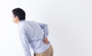 Asian man with back pain