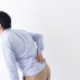 Asian man with back pain