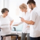 Chiropractic doctor talking to stroke patient